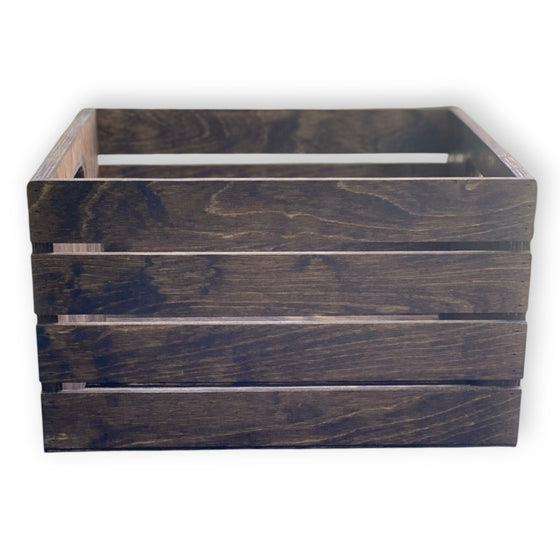 Wooden crate with a dark brown finish on a white background