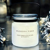 20oz KANA Candle with double wick in a glass jar with black handle lovely Muskoka Pines scent and option to personalize label