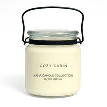  Kana Candle in Cozy Cabin, 20oz soy candle in glass jar with handle & white background