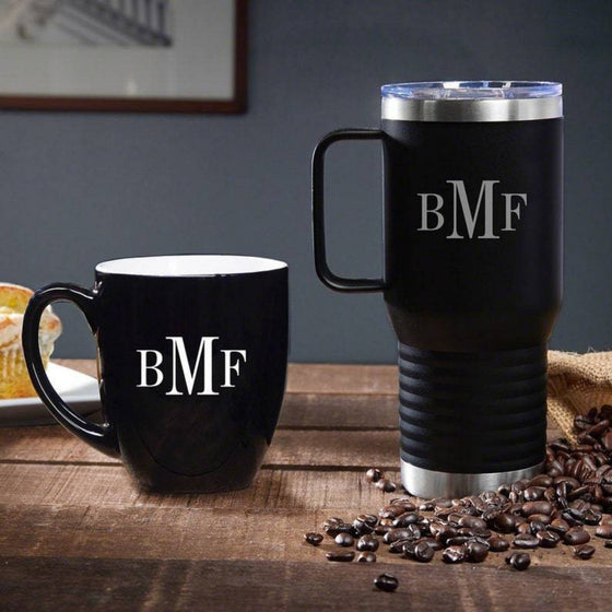 Engraved 16oz black ceramic bistro mug with white interior and custom laser design and 20oz black polar camel mug with custom laser design